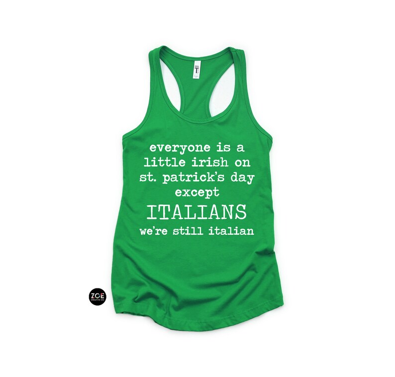 May include: A green racerback tank top with white text that reads "everyone is a little irish on st. patrick's day except ITALIANS we're still italian". The tank top has a scoop neck and a racerback design.
