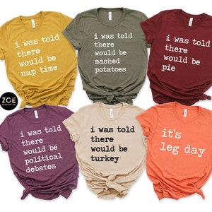 May include: Six different t-shirts with funny Thanksgiving-themed text printed on them. The shirts are in various colors, including mustard yellow, olive green, burgundy, maroon, beige, and orange.
