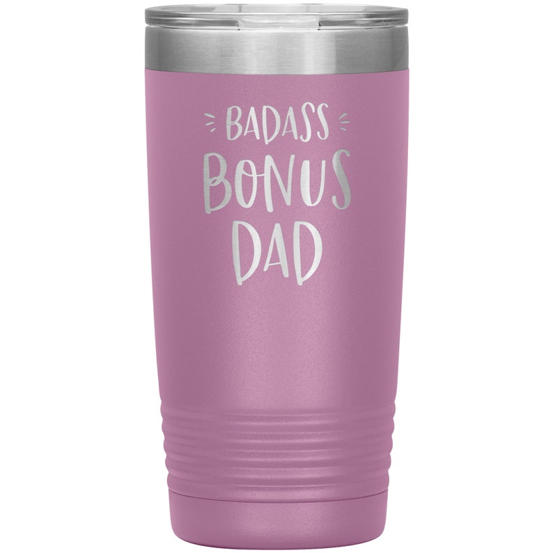 May include: A purple stainless steel tumbler with the text "Badass Bonus Dad" in white lettering.