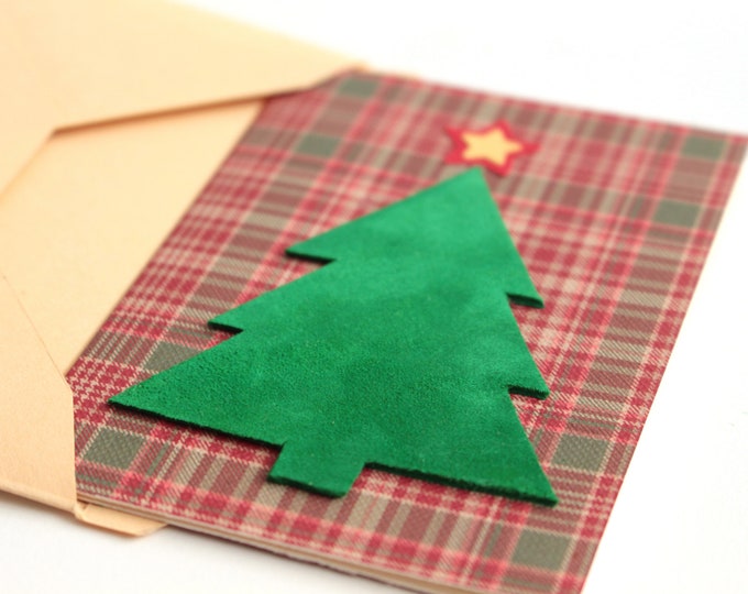 Biglietto natalizio con busta con decorazione in pelle su prezioso cartoncino