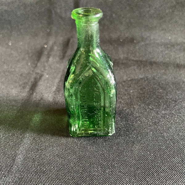 Beautiful Vintage Miniature Green Glass Bottle by Cathedral Brand (Celebrated Remedy)