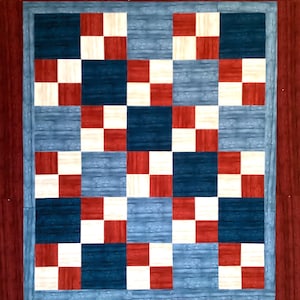 May include: A handmade quilt with a checkerboard pattern in shades of red, white, and navy blue. The quilt has a light blue background and a dark red border. The design is a classic, geometric pattern.