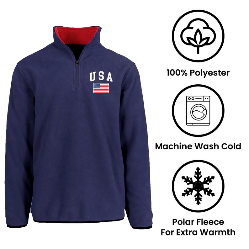 May include: Navy blue fleece pullover with a red collar lining. Features a quarter-zip closure and the word "USA" with an American flag patch. Includes icons indicating 100% polyester, machine wash cold, and polar fleece for extra warmth.