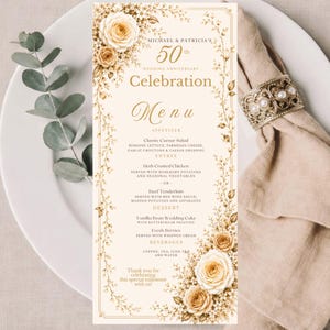 Peut inclure: Une carte de menu rectangulaire pour un 50e anniversaire de mariage sur papier crème avec des bordures florales dorées et des illustrations de roses. Le texte indique Michael & Patricia's 50th Wedding Anniversary Celebration Menu avec les plats.