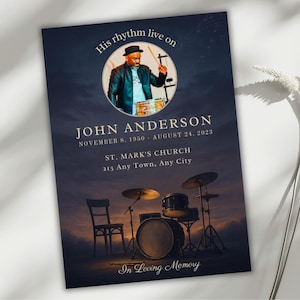 May include: A memorial card featuring a photograph of a man playing drums, with the words "His rhythm live on." The card displays the name "JOHN ANDERSON" and the dates "NOVEMBER 8, 1950 - AUGUST 24, 2023." Below is "ST. MARK'S CHURCH" and address. The words "In Loving Memory" are at the bottom.