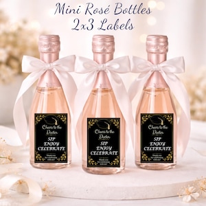 May include: Three mini rosé bottles with pink foil tops, white bows, and black labels that read "Cheers to the Doctor, Sip, Enjoy, Celebrate." The bottles are labeled "2x3 Labels."