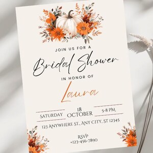 May include: A white and orange bridal shower invitation with a pumpkin and fall foliage design. The invitation reads "Join us for a Bridal Shower in honor of Laura, Saturday, October 18, 5-8 PM, 123 Anywhere St., Any City, ST 12345, RSVP +123-456-7890".