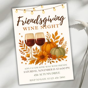 May include: An invitation for a Friendsgiving Wine Night. The design features two wine glasses filled with red wine, pumpkins, sunflowers, and autumn leaves. The text includes the event details: Saturday, November 15 at 6:00 PM, 456 Autumn Drive.