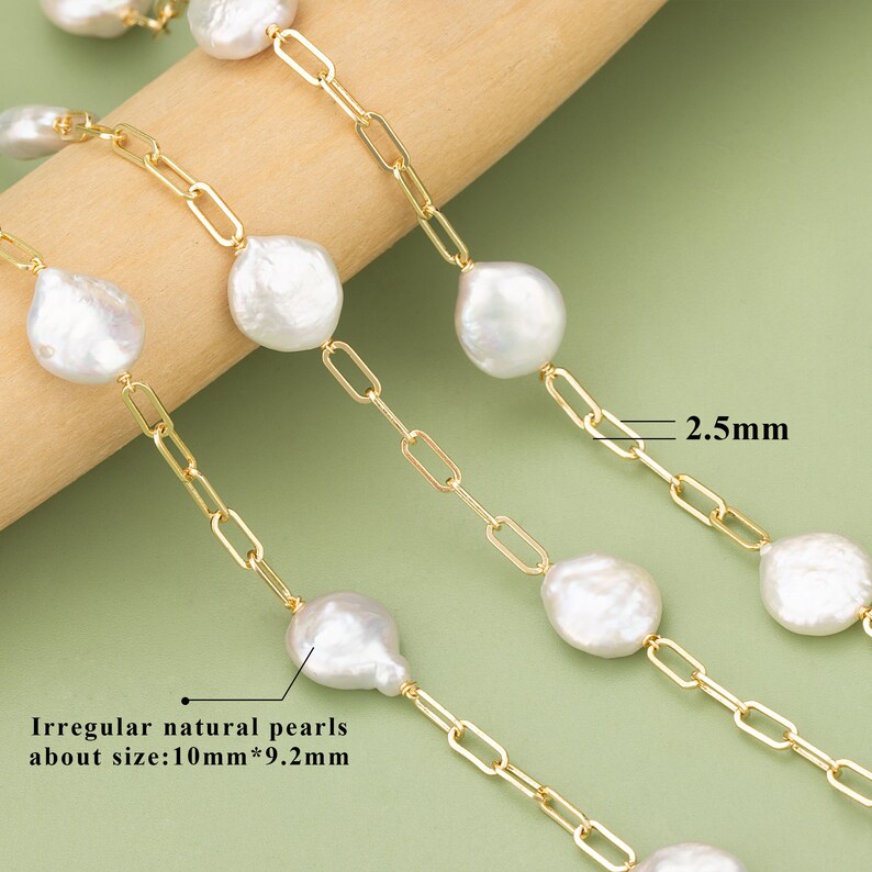 May include: A gold chain necklace with irregular natural pearls. The pearls are approximately 10mm by 9.2mm. The chain links are 2.5mm wide.
