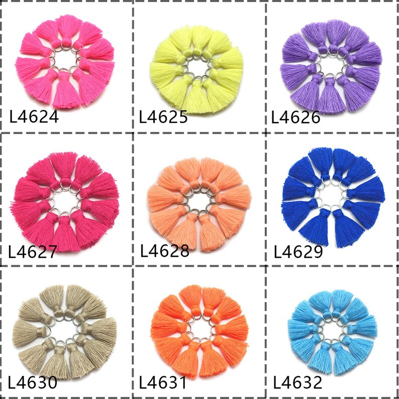 May include: Assortment of 12 colorful tassel keychains, each keychain features a circle of 10 tassels with a silver ring. The keychains are arranged in a grid of 3 rows and 4 columns. The colors are: pink, yellow, purple, red, orange, blue, beige, coral, and light blue. Each keychain is labeled with a product code: L4624, L4625, L4626, L4627, L4628, L4629, L4630, L4631, and L4632.