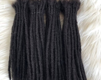 Human hair dreadlock extensions in sizes 0.4 cm and 0.6cm. Bundles of 30locs