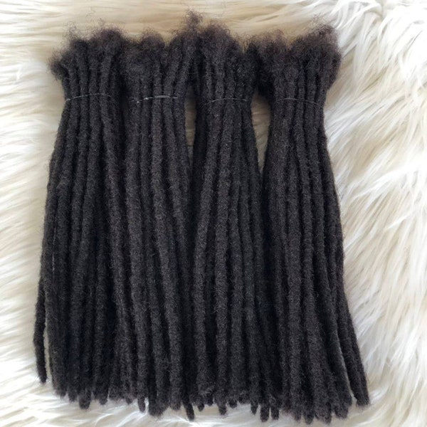 Human hair dreadlock extensions in sizes 0.4 cm and 0.6cm. Bundles of 30locs