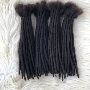 100% human hair permanent dreadlock extensions handmade in 0.5cm width comes in 100loc bundles.