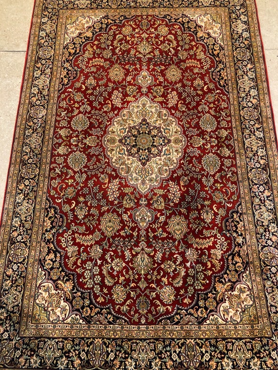 Size 4x6 feet. Silk on silk carpet