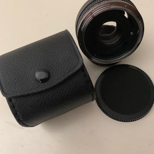 Canon Starblitz Auto Tele Converter 2X Lens