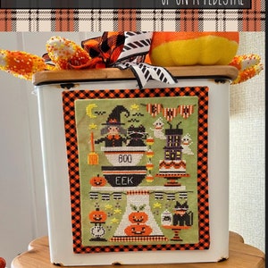 Stitching with the Housewives- Up on a Pedestal- Black Cat Bakery
