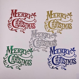 May include: Five glitter-covered "Merry Christmas" cutouts in red, gold, silver, green, and blue.