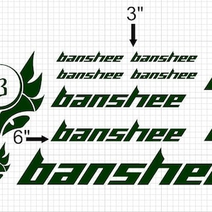May include: A set of green vinyl decals featuring the word "banshee" in a stylized font. The decals are in various sizes, ranging from 3 inches to 12 inches. The set also includes two smaller decals with a stylized "B" and a wing design.