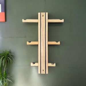 Solid oak coat hook with 6 pegs.  Handmade in UK.
