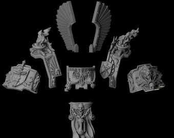 Op de afbeelding: Een set grijze hars miniatuur upgrade onderdelen met gotische architecturale details, waaronder twee gevederde vleugels, twee schouderstukken met zwaard- en leeuwenmotieven, twee met vlammen bekroonde vuurschalen en een centraal rompstuk met schedels.