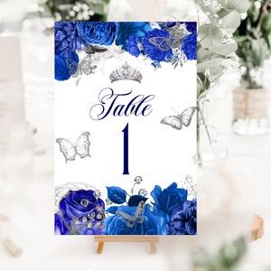 Royal Blue Quinceanera Tabelnummers Blauwe Bloemen Rozen en Zilveren Vlinders Kweepeer Verjaardagsfeestje Zitdecoratie ID243