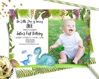 May include: A birthday invitation with a dinosaur theme. The invitation includes the text "Our Little Dino is turning ONE" and "Justin's First Birthday". A photo of a baby is included, along with dinosaur illustrations in watercolour.