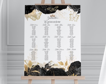May include: A white sign on an easel with the text "Gabriella's Quinceañera." The sign has a black and gold floral design with butterflies. The names of guests are listed under the table numbers.