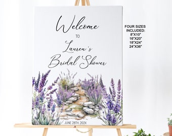 May include: Welcome to Lauren's Bridal Shower sign with a watercolor illustration of lavender flowers and a stone path. The sign also includes the date June 28th, 202X and lists four available sizes: 8x10 inches, 16x20 inches, 18x24 inches, and 24x36 inches.
