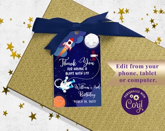 May include: A blue and white thank you tag with a rocket ship, astronaut, and moon. The tag says "Thank You for having a blast with us! William's 2nd Birthday March 28, 20XX".