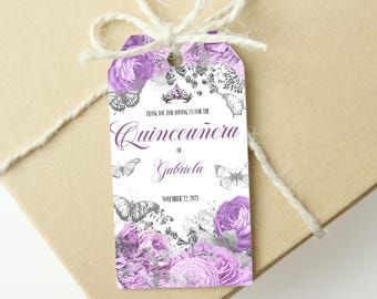 Op de afbeelding: Paarse en zilveren Quinceañera-bedankkaart met vlinders, bloemen en de tekst "Bedankt voor het deelnemen aan de Quinceañera van Gabriela op 22 november 2023".