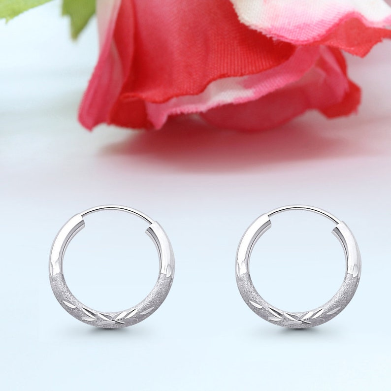 Paradise Jewelers 14K White Gold 1.5mm Diamond Cut Hoop Earrings Paradise Jewelers 14K White Gold 1.5mm Diamond Cut Hoop Earrings