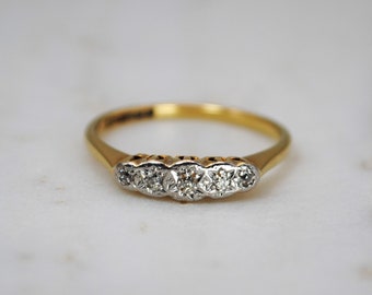 Vintage star set 18ct gold platinum and diamond ring