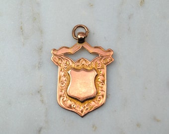 Antique 9ct gold crest charm