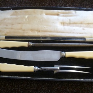 An Antique Faux Bone handled Carving Knife Set by &#39;Firth Brearley&#39; Three piece stainless steel Carving knife set