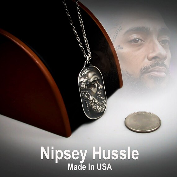 Nipsey hussle malcolm x chain deals