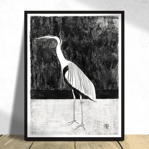 May include: Black and white illustration of a heron standing on a white surface. The heron is facing left and has a long neck and beak. The background is black and textured.