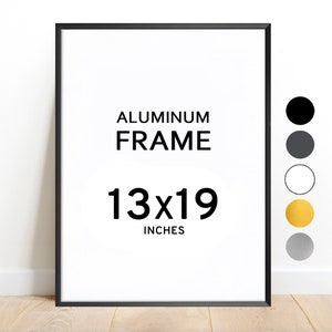 May include: Black aluminium frame with the text "ALUMINUM FRAME 13x19 INCHES".