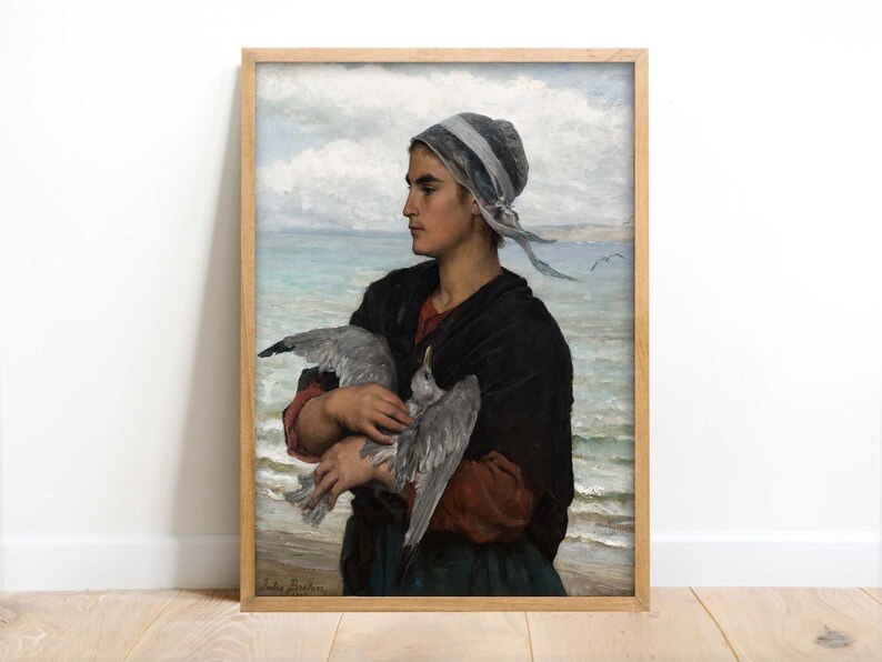 May include: A painting of a woman in a blue and white headscarf holding a seagull in her arms. The woman is wearing a dark brown jacket and a blue skirt. The background is a seascape with a cloudy sky.