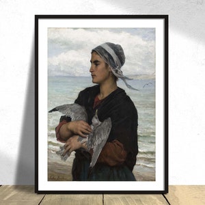 May include: A painting of a young woman in a blue and white headscarf holding a seagull in her arms. She is standing on a beach with the ocean in the background.