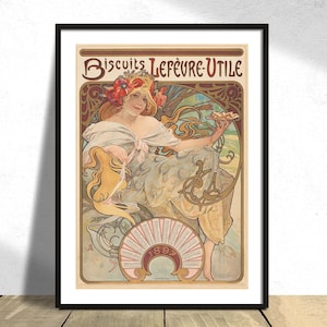 May include: A vintage poster advertising "Biscuits Lefèvre-Utile" featuring an Art Nouveau style illustration of a woman holding a plate of biscuits. The poster is framed in black and has a white background.