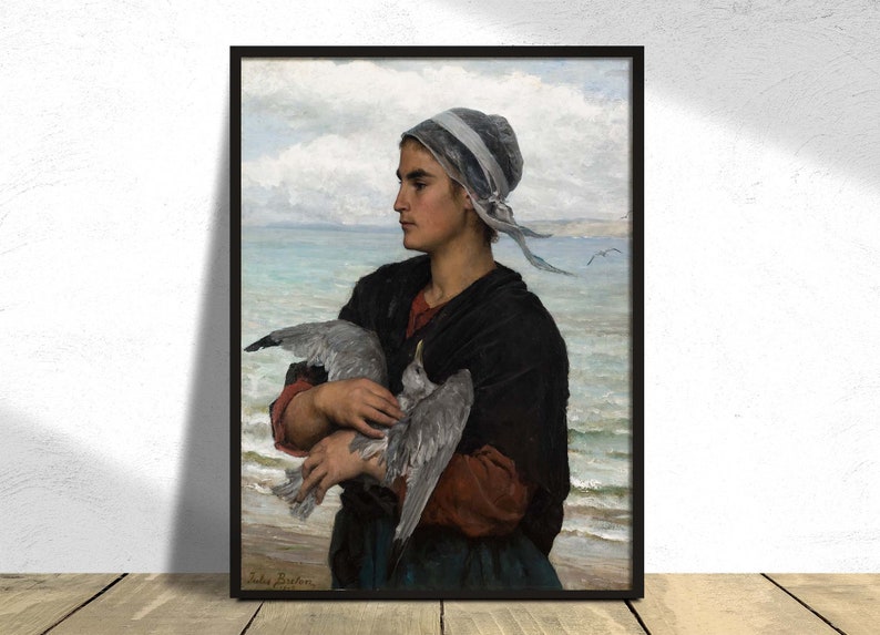 May include: A painting of a woman in a white cap and dark clothing holding a seagull in her arms. The woman is standing on a beach with the ocean in the background.