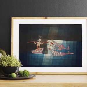 May include: A framed illustration of a person in a boat with a long stick, fishing for a large fish with a smaller fish swimming nearby. The background is a blue and gray watercolor wash.