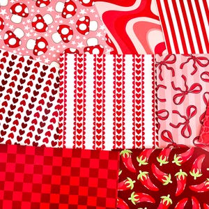 May include: A collection of red and white patterned papers. Designs include mushrooms, hearts, stripes, bows, and a checkerboard. The papers are arranged in a patchwork style, showcasing a variety of textures and patterns.