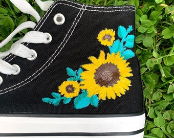 white converse with sunflowers