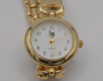 Reloj de pulsera para mujer LIP/reloj redondo/reloj de cuarzo de los años 80/reloj chapado en oro/emblema de la casa de los labios en la parte posterior/idea de regalo
