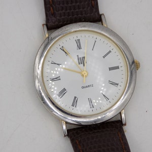Reloj, LIP CLASSIC, Reloj Redondo, Reloj de Cuarzo, Años 70, Reloj de Hombre, Esfera de Acero, Diseño Fino, Correa de Cuero Marrón, Idea de Regalo.