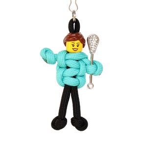 May include: A set of three ceramic mugs with a speckled, matte finish. The mugs are in shades of cream, light gray, and dark gray. Each mug has a simple, minimalist design, perfect for coffee or tea.