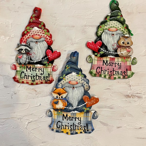 Frosty Forest Friends Christmas ornament. Christmas elves with 3 designs Red hat-Racoon, Green Hat-Owl, Blue Hat-Fox. 6 X 3.75 inches