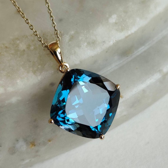 London blue topaz outlet pendant yellow gold