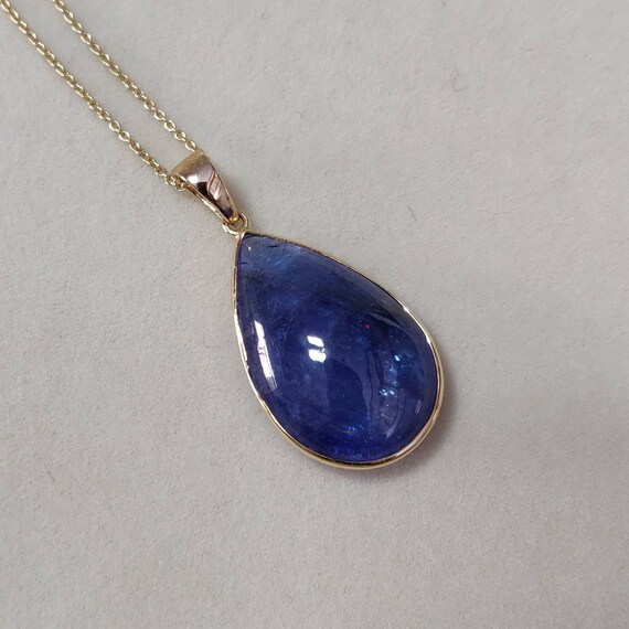 Gold tanzanite best sale pendant